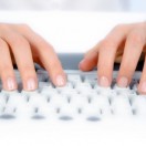 Hands on computer keyboard Hands on computer keyboard